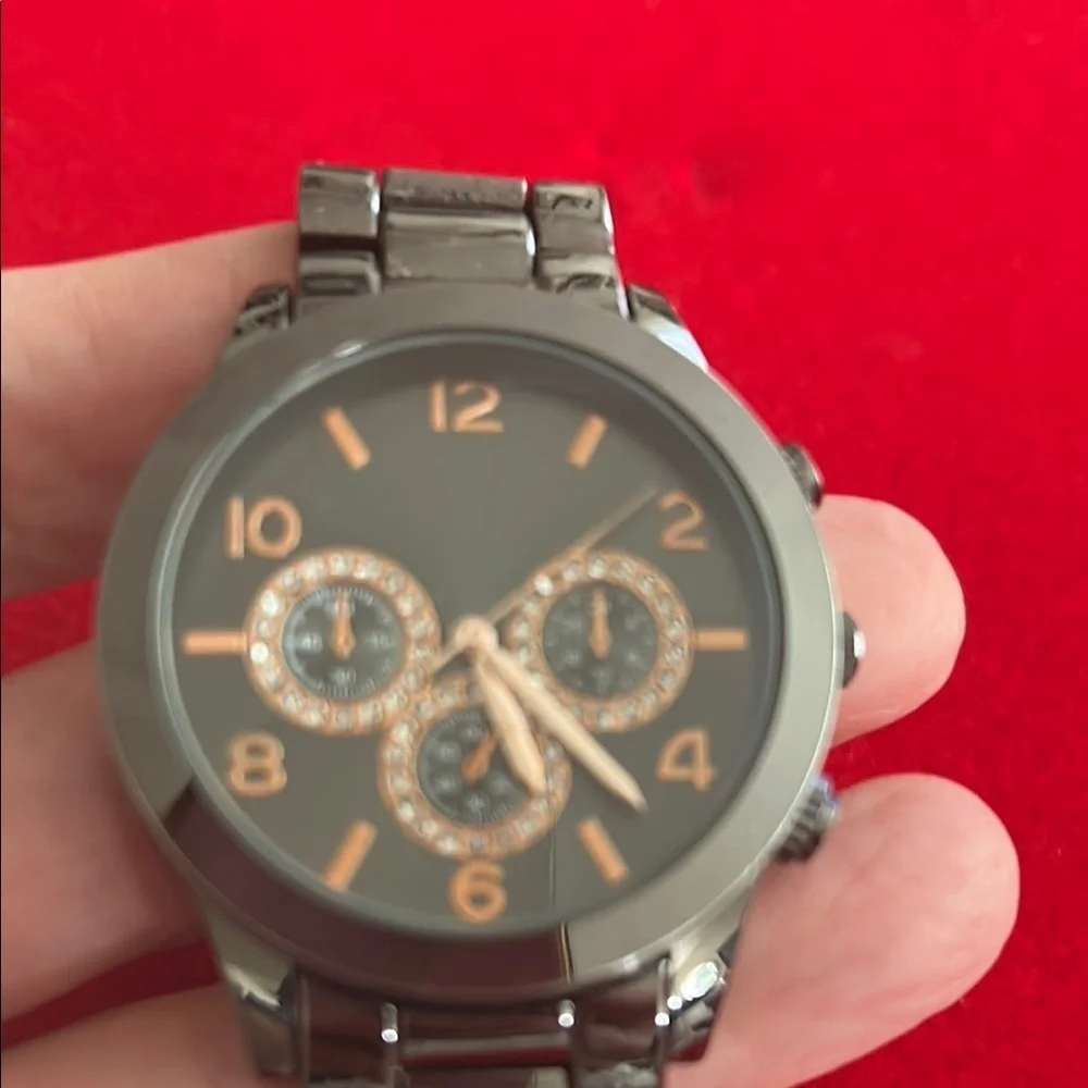 Black Metal Watch with Gold Accents